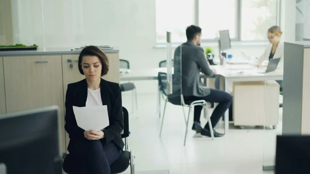 Candidate reading her CV before a job interview