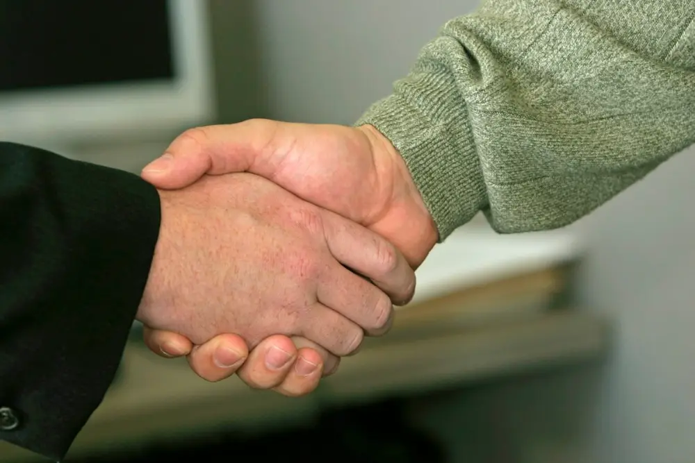 Close-up handshake after a job offer