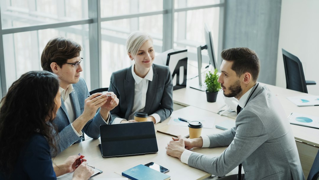 Manager discussing a project with employees