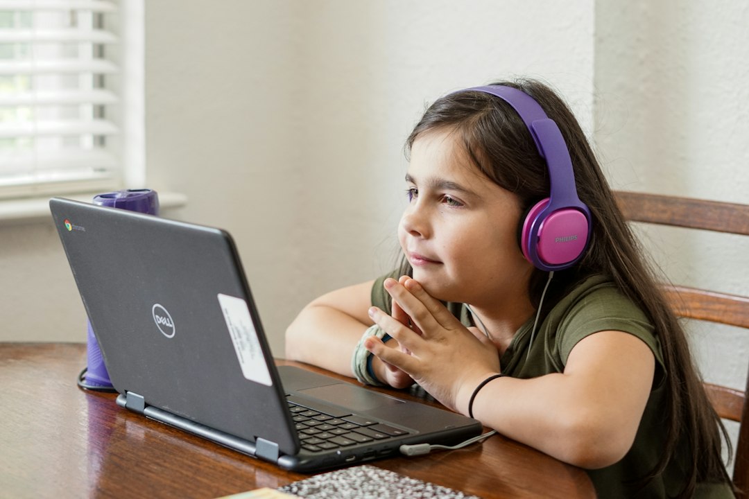 Student joining online science classes from home on a laptop