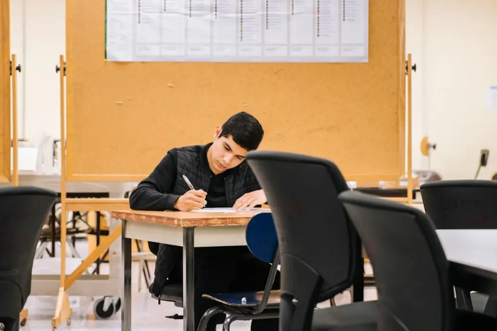 Student studying at a desk to improve science grades